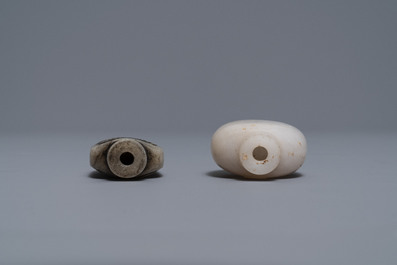 Three Chinese greyish white and black and white jade snuff bottles, 19/20th C.