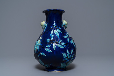 A Chinese fahua relief-decorated vase, 19th C.