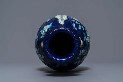 A Chinese fahua relief-decorated vase, 19th C.