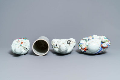 Three Chinese famille rose figures and a qianjiang cai hat stand, 19/20th C.