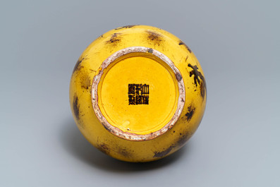 A Chinese yellow-ground bottle vase with a dragon, Qianlong mark, 19/20th C.