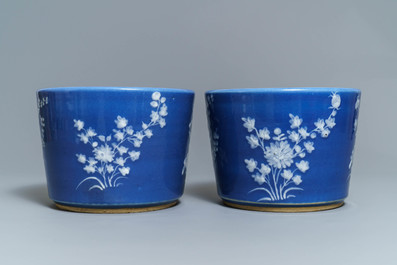 A pair of Chinese blue-ground slip-decorated jardini&egrave;res, 19th C.