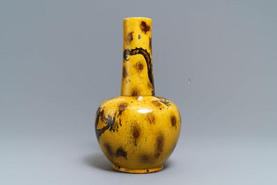 A Chinese yellow-ground bottle vase with a dragon, Qianlong mark, 19/20th C.