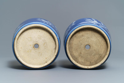 A pair of Chinese blue-ground slip-decorated jardini&egrave;res, 19th C.