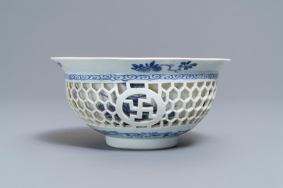 A Chinese blue and white reticulated double-walled bowl, Kangxi