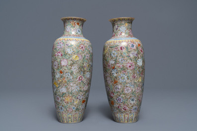 A pair of Chinese famille rose 'millefleurs' eggshell vases, Qianlong mark, Republic, 20th C.