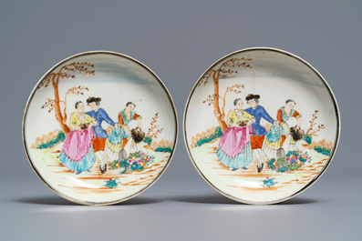 A pair of fine Chinese famille rose 'European subject' cups and saucers, Qianlong