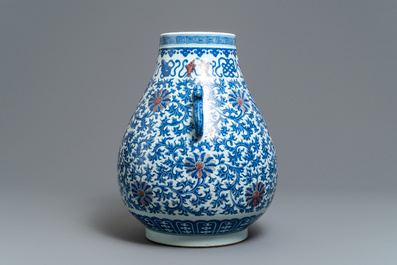 A Chinese blue, white and copper red 'hu' vase, Qianlong mark, 19/20th C.