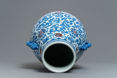 A Chinese blue, white and copper red 'hu' vase, Qianlong mark, 19/20th C.