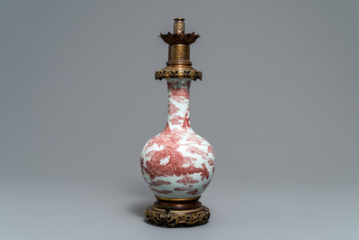 A Chinese underglaze red bottle-shaped 'dragon' vase with gilt-bronze mounts, 18/19th C.
