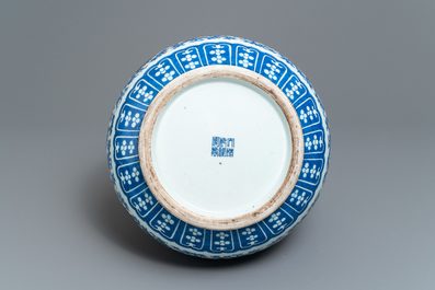 A Chinese blue, white and copper red 'hu' vase, Qianlong mark, 19/20th C.