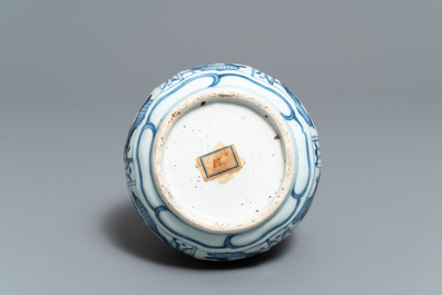 A Chinese blue and white bottle vase with flowers, Wanli
