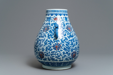 A Chinese blue, white and copper red 'hu' vase, Qianlong mark, 19/20th C.