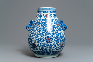 A Chinese blue, white and copper red 'hu' vase, Qianlong mark, 19/20th C.