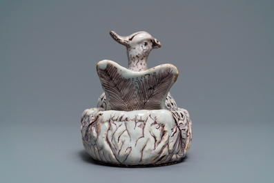 A Dutch Delft manganese 'plover' butter tub and cover, 18th C.