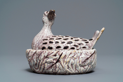 A Dutch Delft manganese 'plover' butter tub and cover, 18th C.
