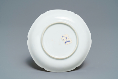 A Chinese grisaille and gilt eggshell cup and saucer, Yongzheng