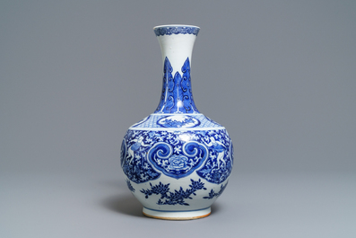 A Chinese blue and white bottle vase with dancers on a floral ground, 19th C.