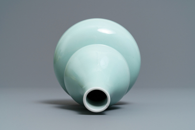 A Chinese monochrome celadon double gourd vase, Qianlong mark, 19th C.
