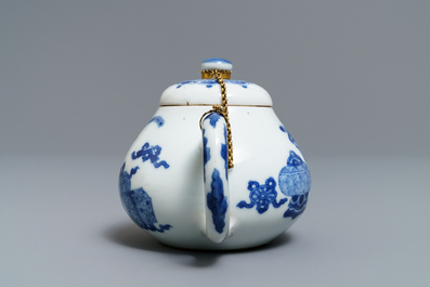 A Chinese blue and white gilt brass-mounted teapot, Jiajing mark, Kangxi