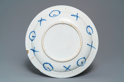 A Dutch Delft blue and white chinoiserie vase and a dish, late 17th C.