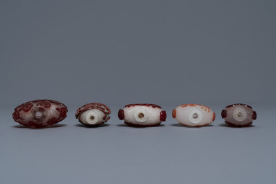 Ten Chinese red overlay, snowflake and transparent glass snuff bottles, 18/20th C.