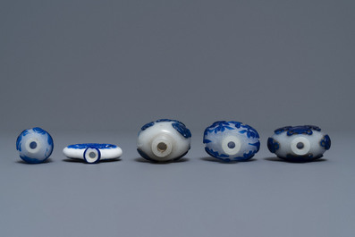 Nine various Chinese blue overlay glass snuff bottles, 19/20th C.