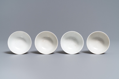 Four Chinese famille rose 'mandarin' cups and saucers, Qianlong