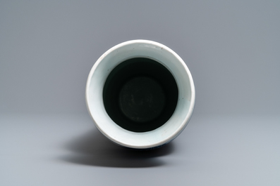 A Chinese blue and white sleeve vase with figural design all-round, Transitional period