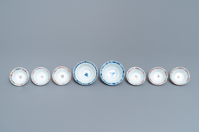 Eight Chinese blue and white and famille rose cups and saucers and three plates, Kangxi/Qianlong