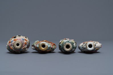 Four Chinese famille rose porcelain relief-decorated snuff bottles, 19th C.