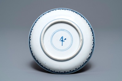 Twelve Chinese blue and white cups and saucers, 19th C.