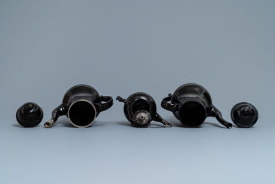 Four silver-mounted Namur black-glazed pottery coffeepots and a teapot, 18th C.