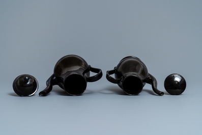 Four silver-mounted Namur black-glazed pottery coffeepots and a teapot, 18th C.