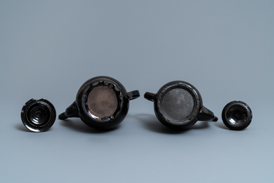 Four silver-mounted Namur black-glazed pottery coffeepots and a teapot, 18th C.