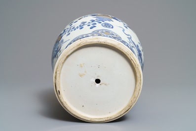 A Chinese gilt-decorated blue and white vase with floral design, Kangxi