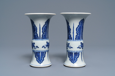 A pair of Chinese blue and white 'gu' vases, Kangxi