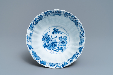 A Chinese blue and white bowl with mythical beasts and flowers, Kangxi