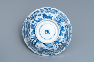 A Chinese blue and white bowl with mythical beasts and flowers, Kangxi