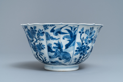 A Chinese blue and white bowl with mythical beasts and flowers, Kangxi