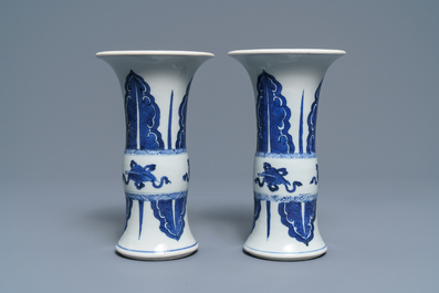 A pair of Chinese blue and white 'gu' vases, Kangxi