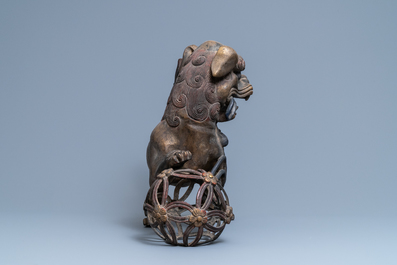 A pair of large Chinese gilt-lacquered bronze Buddhist lions, 19th C.