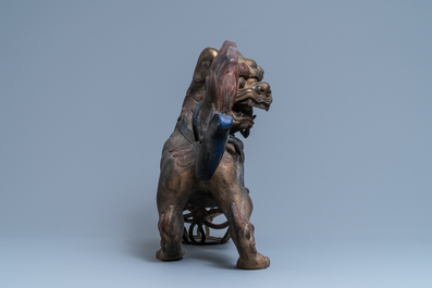 A pair of large Chinese gilt-lacquered bronze Buddhist lions, 19th C.