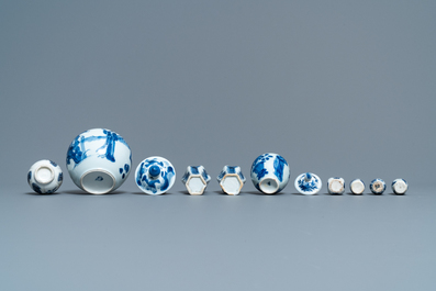 Nine small Chinese blue and white 'Long Eliza' vases, Kangxi