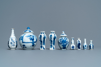 Nine small Chinese blue and white 'Long Eliza' vases, Kangxi