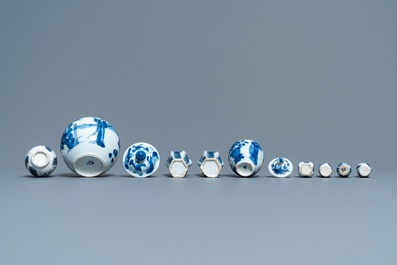 Nine small Chinese blue and white 'Long Eliza' vases, Kangxi