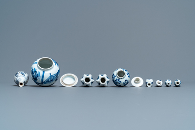 Nine small Chinese blue and white 'Long Eliza' vases, Kangxi