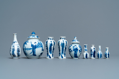 Nine small Chinese blue and white 'Long Eliza' vases, Kangxi