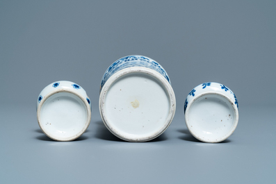 A Chinese blue and white brush pot and a pair of sanders, Kangxi