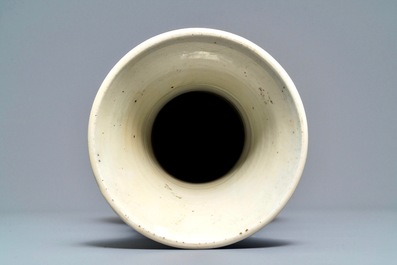 A Chinese powder blue-ground vase with landscape medallions, Kangxi